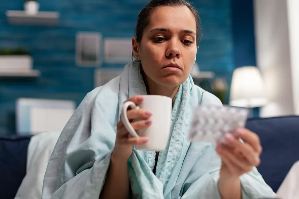 ঋতু পরিবর্তনে সুস্থ থাকুন 8 young sick woman with infection symptoms home